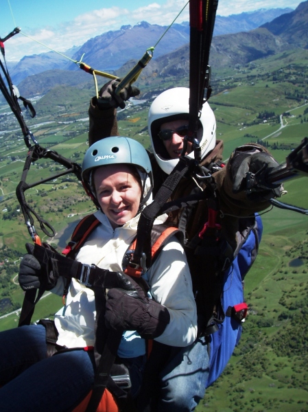 Becky and our guide/hostelier Adin, tandem paragliding.