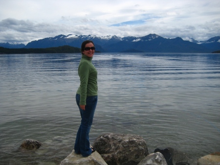 Becky on the edge of Lake Manapouri.