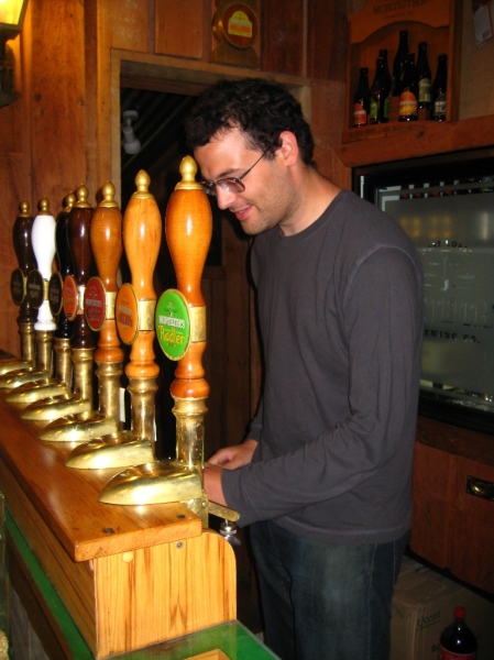 Jonathan pours his own pint at the brewery's bar.